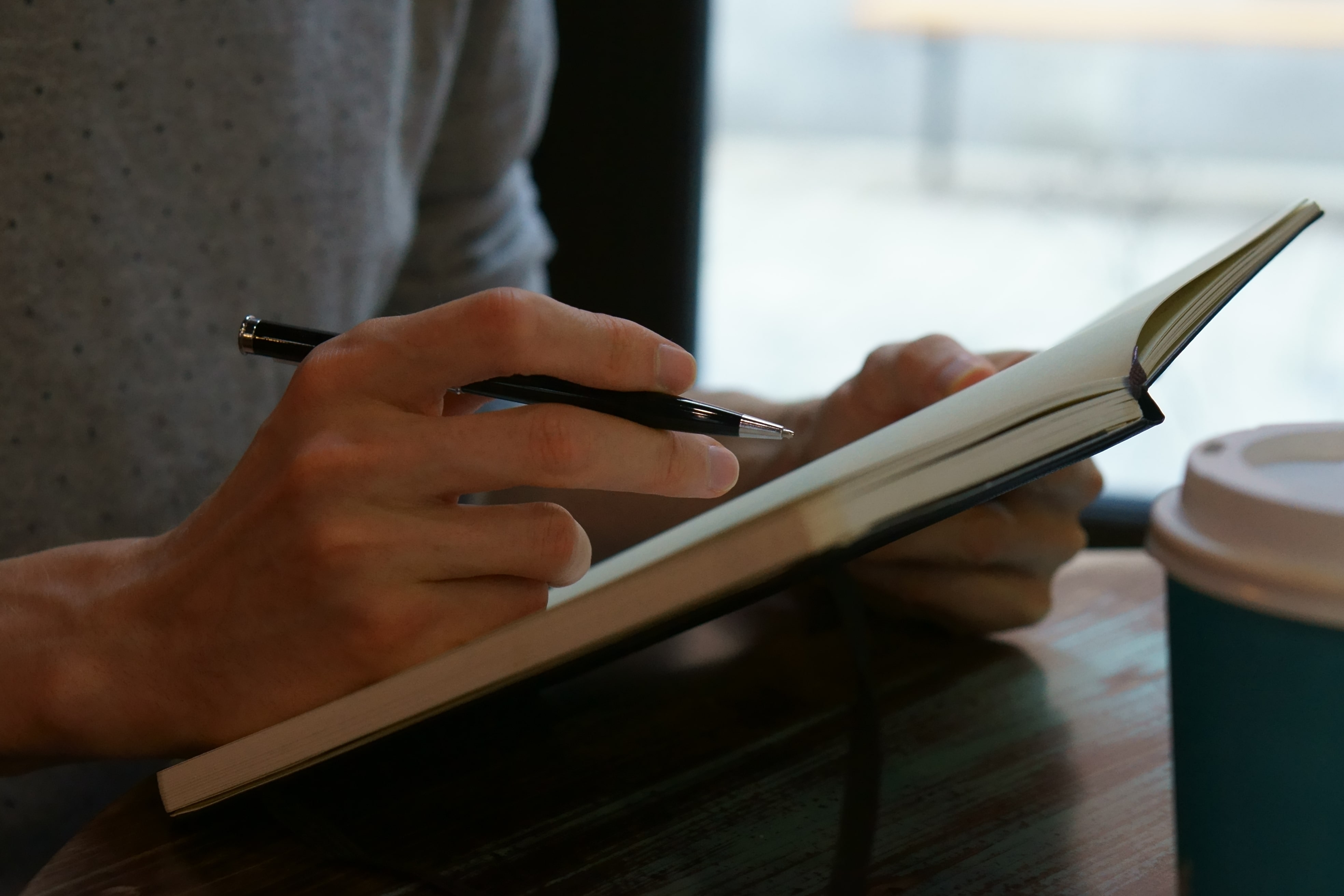 Open notebook or journal with a half-written personal story