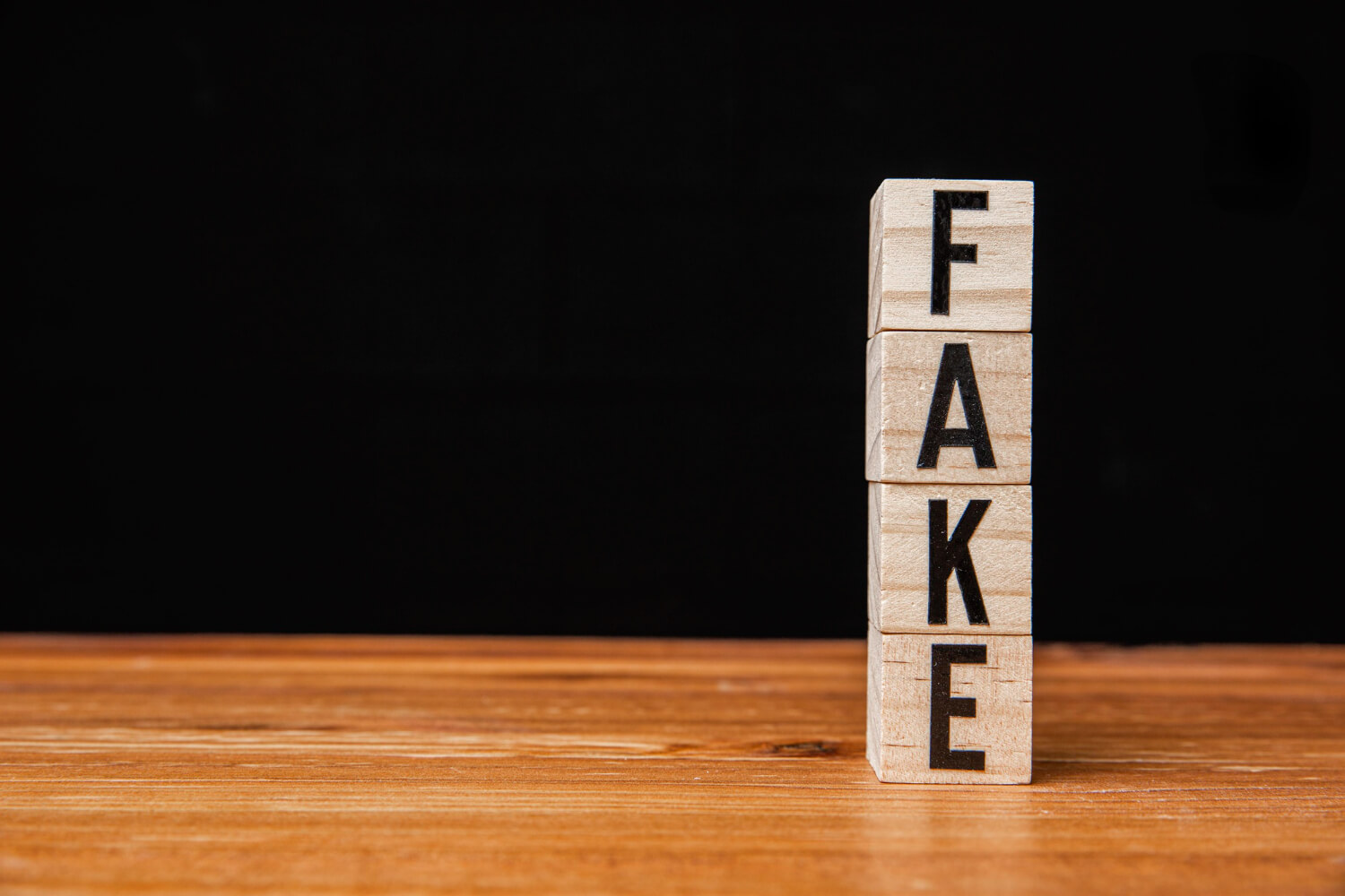 fake news on wooden table