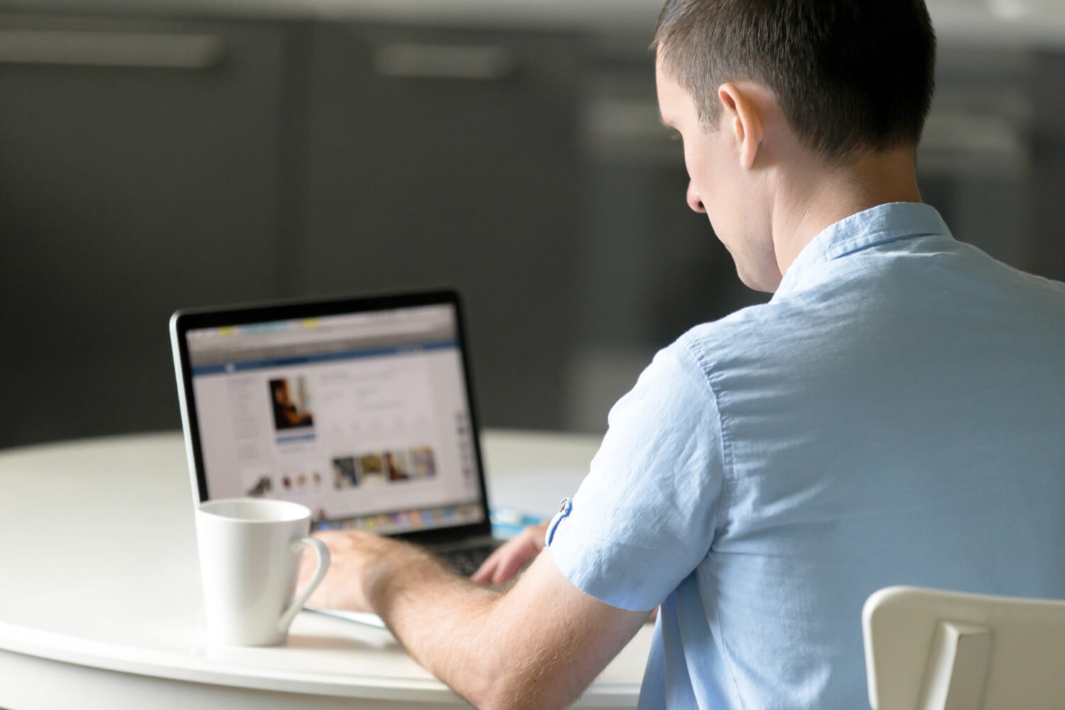 man looking at a website